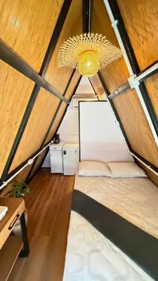 Uma cama ou camas num quarto em Cabana no Morro do Macaco