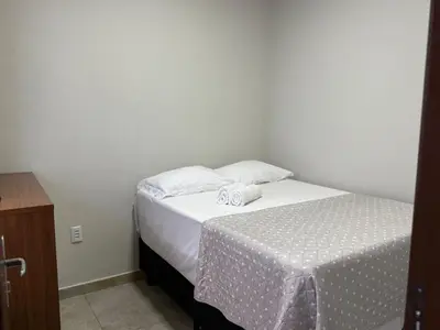 Uma cama ou camas num quarto em Maria Olga 10