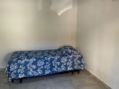 Uma cama ou camas num quarto em Maria Olga 10