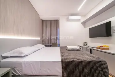 Uma cama ou camas num quarto em 306 - Ótima suíte em Excelente Localização- Praia de Bombinhas a 120m