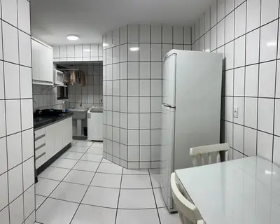 A cozinha ou kitchenette de Apartamento Lateral - Predio frente mar