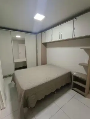 Uma cama ou camas num quarto em Apartamento térreo Canto Grande