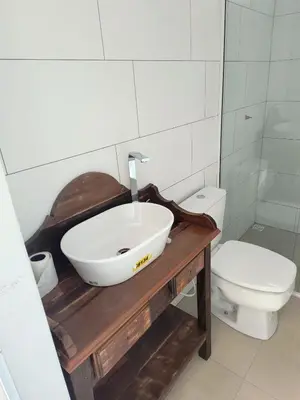 Uma casa de banho em Doce Refúgio em Zimbros