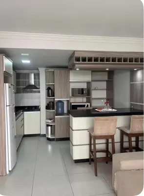 A cozinha ou kitchenette de Apartamento térreo próximo Morro do Macaco e Centro Comercial 100m da Praia