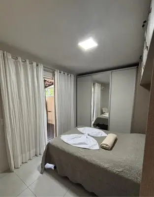 Uma cama ou camas num quarto em Apartamento térreo próximo Morro do Macaco e Centro Comercial 100m da Praia