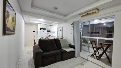 Uma área de estar em Apartamento Oasis de Palmas Seu paraiso na Praia