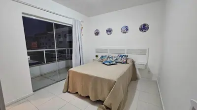 Uma cama ou camas num quarto em Apartamento Oasis de Palmas Seu paraiso na Praia