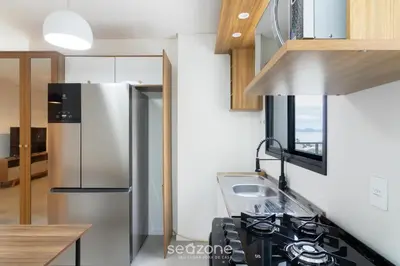 A cozinha ou kitchenette de Aptos a 220 da Praia de Perequê próx. do Centro - ARFs