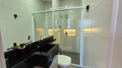 Uma casa de banho em Loft Completo Vista Yachthouse |CURTA203