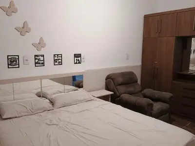 Uma cama ou camas num quarto em Casa grande e confortável!