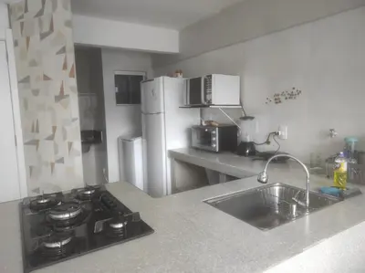 A cozinha ou kitchenette de Pé na Areia com Garagem GRÁTIS 3 Quartos na Orla de Balneário Camboriú