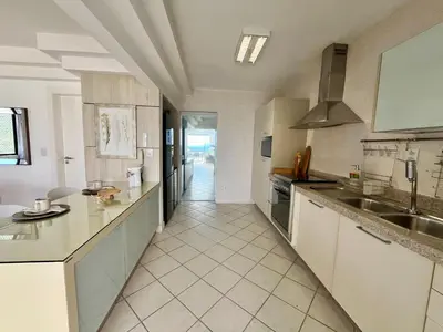 A cozinha ou kitchenette de Cobertura Quebec Beira-Mar
