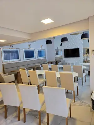 Uma televisão e/ou sistema de entretenimento em Departamento Premium Bombas Brasil