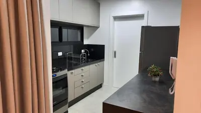 A cozinha ou kitchenette de MEIA PRAIA Apartamento - Itapema