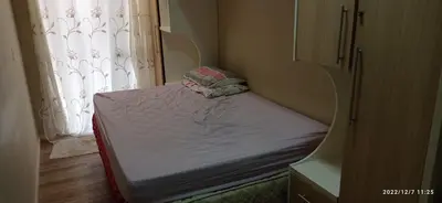 Uma cama ou camas num quarto em AP Edif california em Itapema 1 quadra do mar