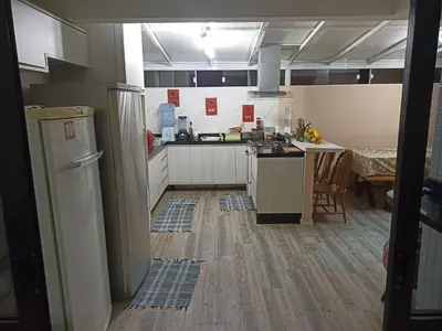 A cozinha ou kitchenette de AP Edif california em Itapema 1 quadra do mar