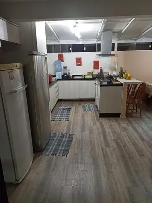 A cozinha ou kitchenette de AP Edif california em Itapema 1 quadra do mar