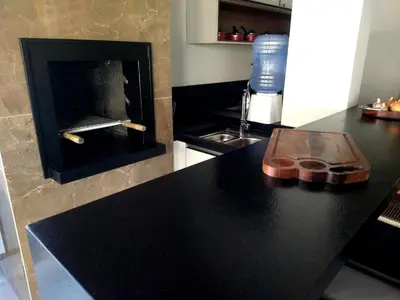 A cozinha ou kitchenette de Apartamento aconchegante 100 metros do mar