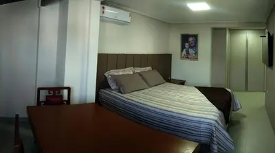 Uma cama ou camas num quarto em Apartamento aconchegante 100 metros do mar