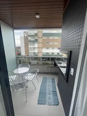 Uma varanda ou terraço em Edifício Arpoador Praia de Palmas - 250m da praia