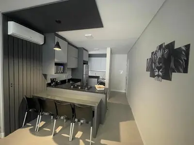 A cozinha ou kitchenette de Edifício Arpoador Praia de Palmas - 250m da praia