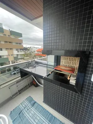 Uma área de estar em Edifício Arpoador Praia de Palmas - 250m da praia