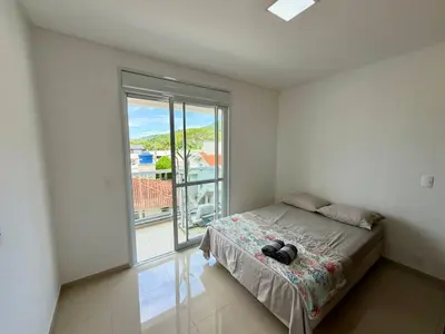 Uma cama ou camas num quarto em Paz e Conforto Seu Lar na Vila de Palmas