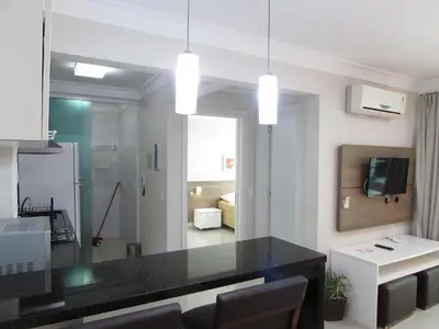 Uma televisão e/ou sistema de entretenimento em Bombinhas summer bech