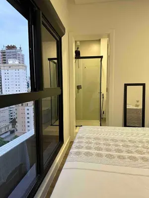 Uma cama ou camas num quarto em Apartamento novo com duas suites e proximo ao mar e ao Hard Rock Cafe