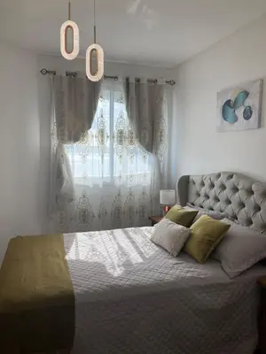 Uma cama ou camas num quarto em Hermoso apartamento con vista al Mar