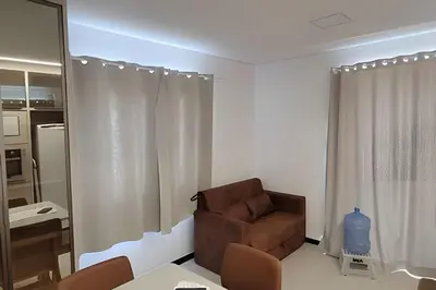 Uma área de estar em Apto Corsário com Piscina á 100m Praia Palmas/SC