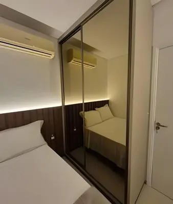 Uma cama ou camas num quarto em Apto Corsário com Piscina á 100m Praia Palmas/SC