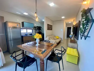 Uma televisão e/ou sistema de entretenimento em Oceana Suites Porto Belo