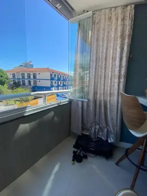 Uma área de estar em Apartamento Centro de Bombinhas