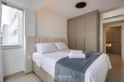 Uma cama ou camas num quarto em Conforto e Praticidade a 350 m do mar em Balneário Camboriú - RLPs