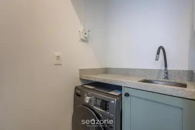 A cozinha ou kitchenette de Conforto e Praticidade a 350 m do mar em Balneário Camboriú - RLPs