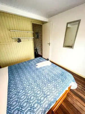 Uma cama ou camas num quarto em Pousada Canto do Pescador