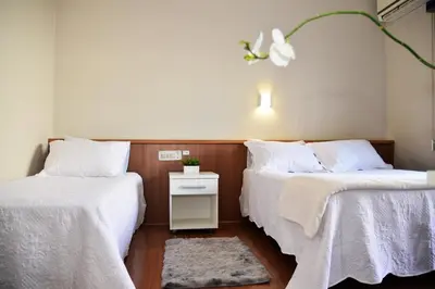 Uma cama ou camas num quarto em Hotel do Valle