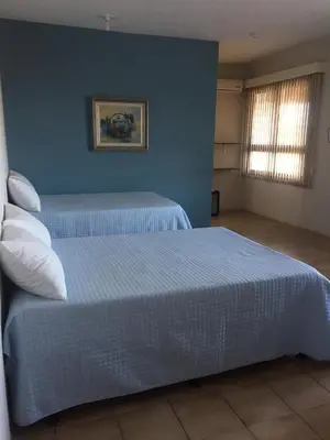 Uma cama ou camas num quarto em Hotel do Valle