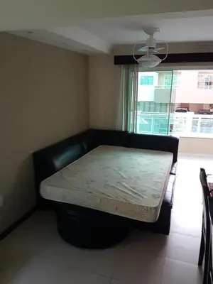 Uma cama ou camas num quarto em Novo Lar 1 Bombinhas (Eliseos)