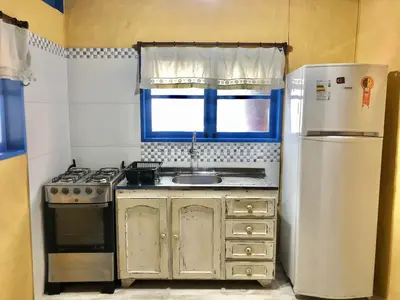 A cozinha ou kitchenette de Chalés no centro de Bombinhas