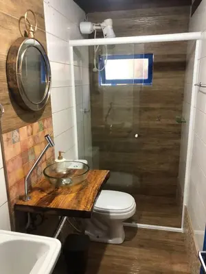 Uma casa de banho em Chalés no centro de Bombinhas