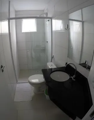Uma casa de banho em Costa do Sol Residencial