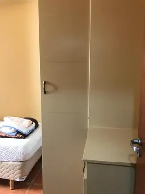 Uma cama ou camas num quarto em IMACULADO APARTAMENTO A 20 METROS DA PRAIA
