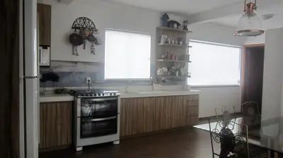 A cozinha ou kitchenette de loft lindo em Mariscal