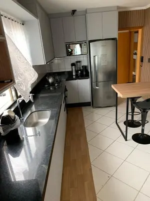 A cozinha ou kitchenette de Cobertura frente ao mar Meia Praia -Itapema -SC
