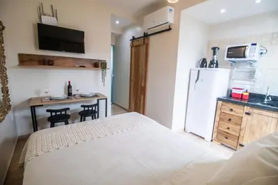 A cozinha ou kitchenette de Hospedagem Morada Nativa Praia Bombas