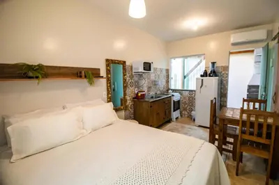A cozinha ou kitchenette de Hospedagem Morada Nativa Praia Bombas