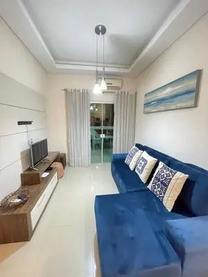 Uma televisão e/ou sistema de entretenimento em Apartamento Terra Nova Mariscal