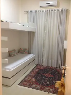 Uma cama ou camas num quarto em Apartamento Terra Nova Mariscal